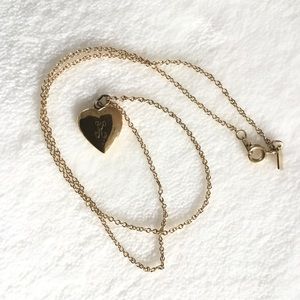 Letter K engraved gold tone mini locket